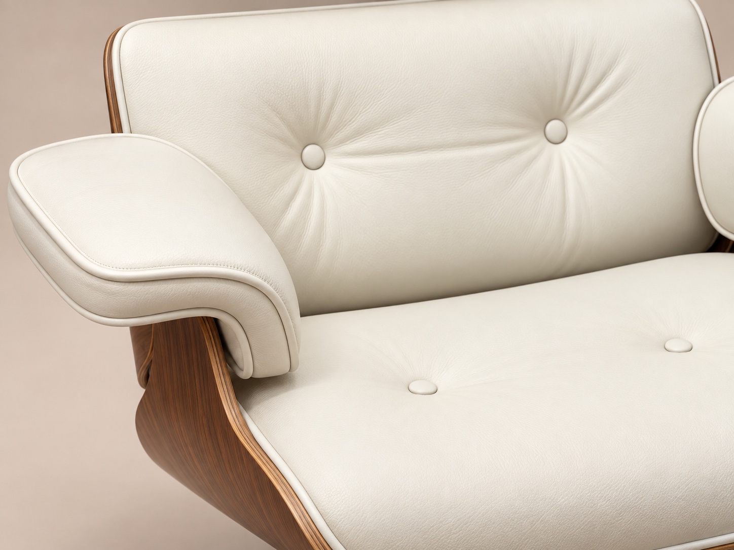 Close-up of white leather grain, button tufting, piping and walnut shell